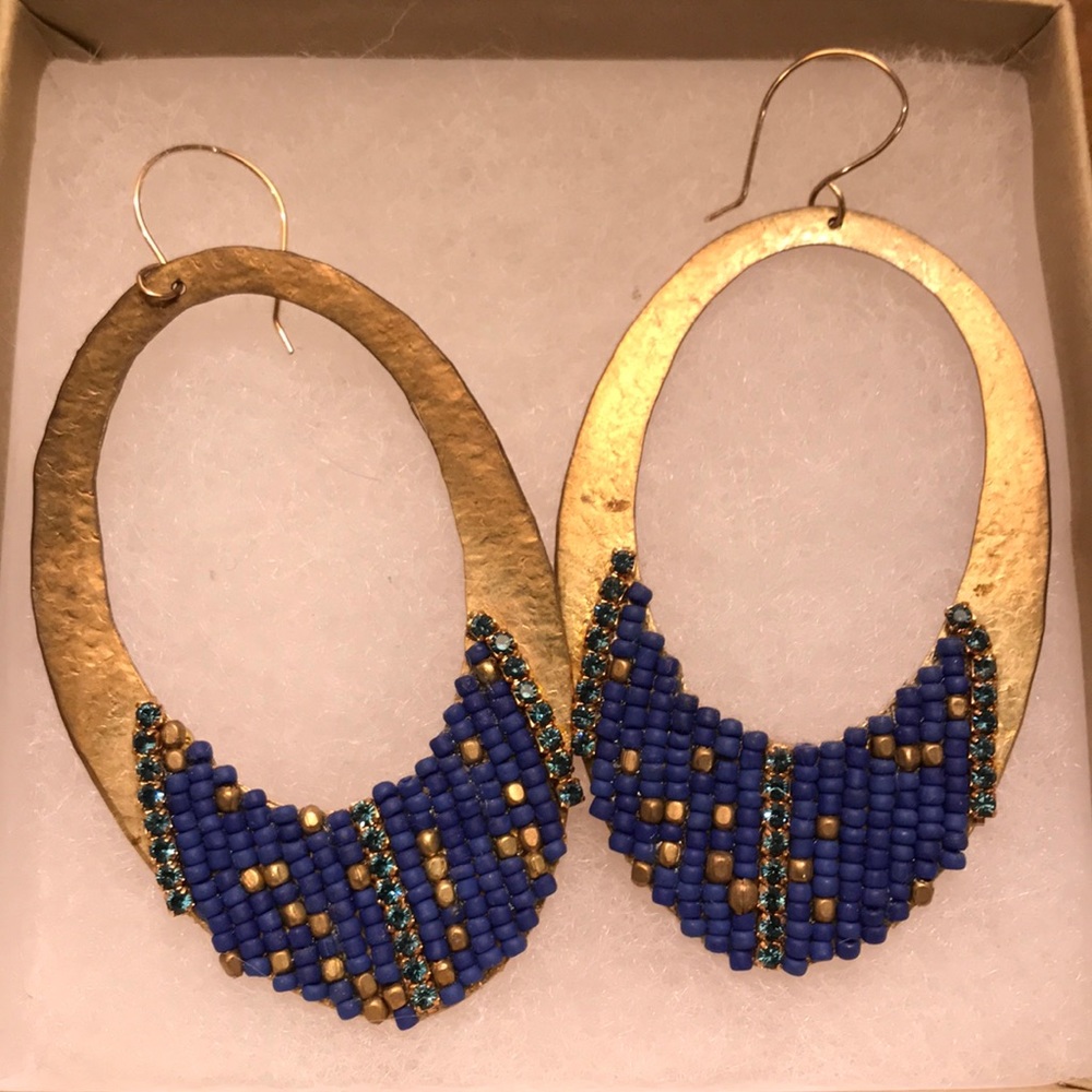 gold dangle earrings with blue beading